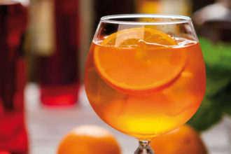 Orange Drink In Wineglass.