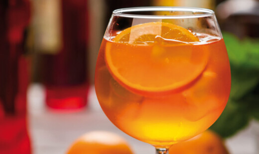 Orange Drink In Wineglass.