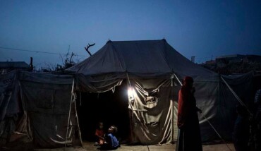 Children Sit At The Entrance To A Tent In A Camp For Internally Displaced People In Mashqafah, Near Aden, Yemen
