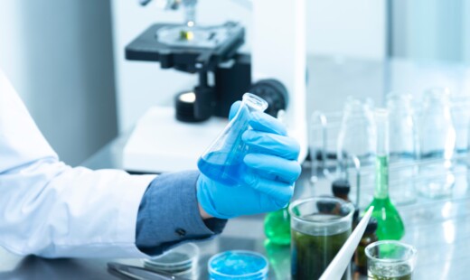 Person Holding Laboratory Flask 2280571