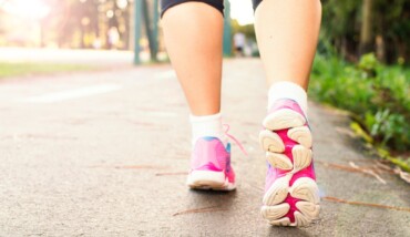 Photo Of Woman Wearing Pink Sports Shoes Walking 1556710
