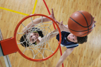 Competition Cencept With People Who Playing Basketball In School Gym