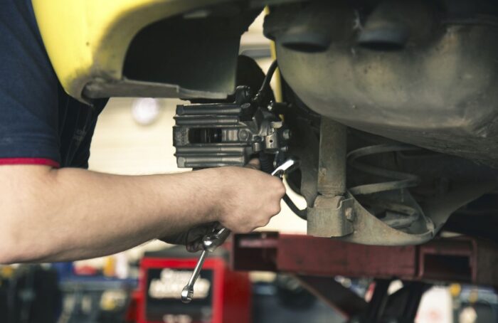 Free Person Doing Car Maintenance Image, Public Domain Car CC0 Photo.